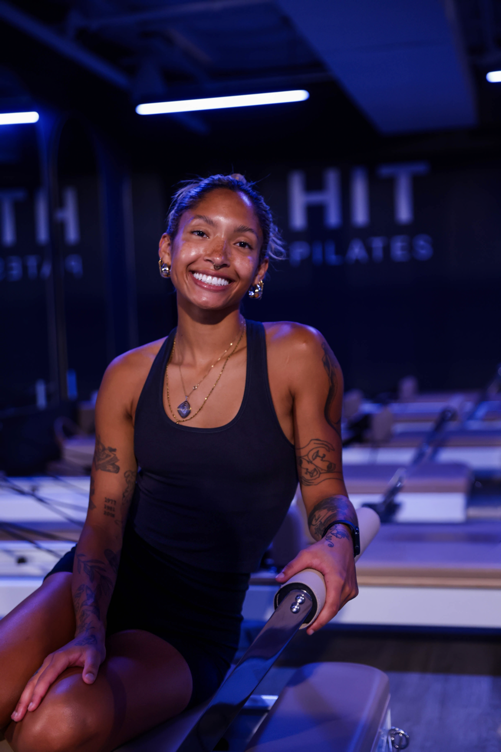 Pilates instructor Nicole teaches reformer pilates at HIT Athletic gym in Austin